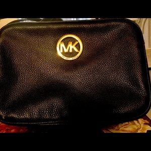 Michael Kohr’s black purse
